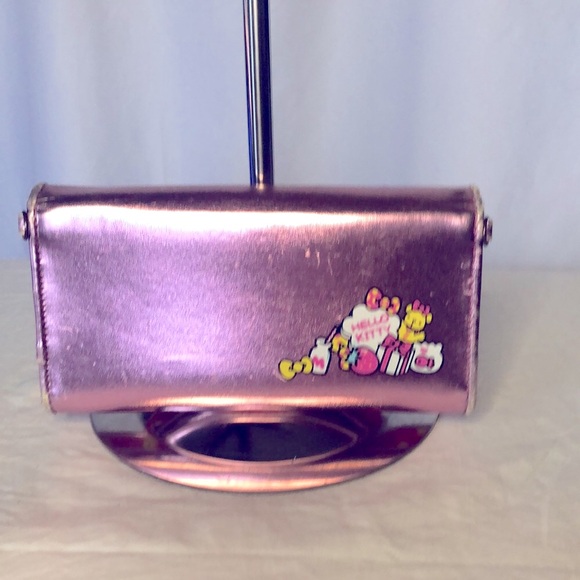 HELLO KITTY metallic pink wallet. Holds up to 16 cards. Polka dot lining inside. - Picture 3 of 16